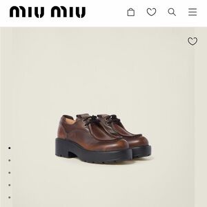 Miu Miu laced fumé leather shoes